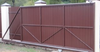 Купить откатные ворота из профнастила Глазов, цена от 1733 руб.